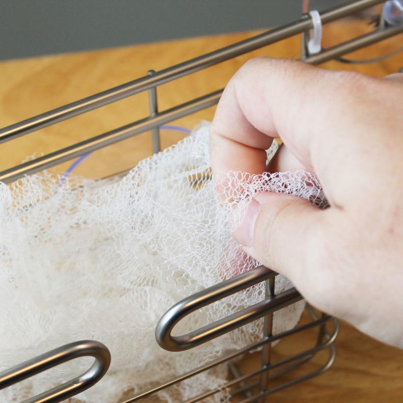 Line the shower caddy with the loofah.