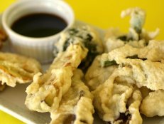 Tempura is a style of deep-frying that emphasizes the fresh flavors of vegetables within a light, crispy coating.