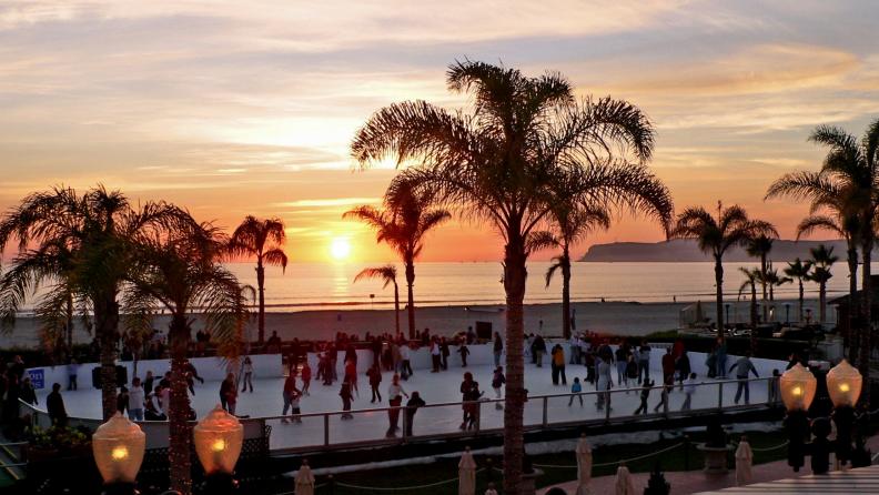 It's not what most people envision doing by the beach, but Hotel del Coronado in San Diego sets up a rink along the Pacific Ocean for <a target="_blank" href="http://hoteldel.com/activities/coronado-events/">holiday ice skating</a>. The year 2014 marked the 11th year that hotel has had the rink on its lawn, with views of Coronado beach and sunsets over the ocean.
