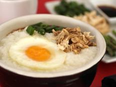 Slow cooker congee can be topped with a wide variety of proteins or vegetables.