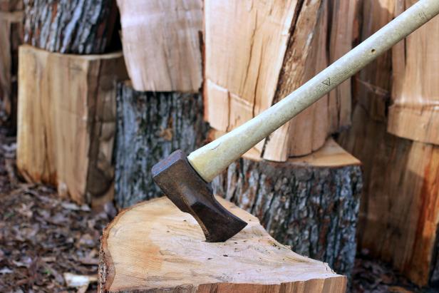 firewood being split by an ax