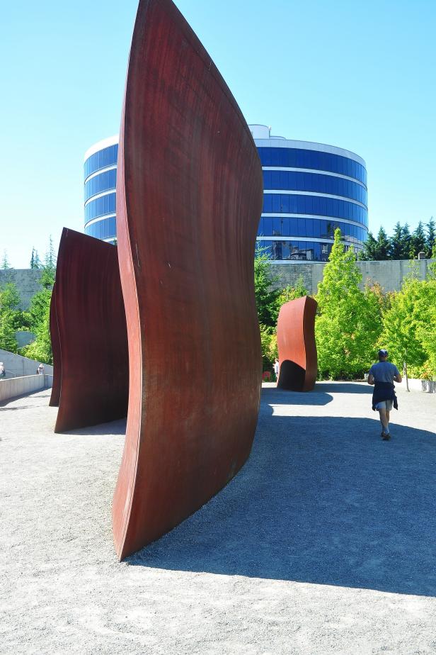 One  of the largest sculptures at the Olympic Sculpture Park is <i>Wake</i> by  noted minimalist sculptor Richard Serra. Its towering and massive scale  evokes a ship's hull and in fact was created using computer imaging and  machines that manufacture ship hulls.