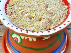 Clay pots are so versatile and can be used in so many unique ways. Here we show how to use them to create a personalized bird feeder.