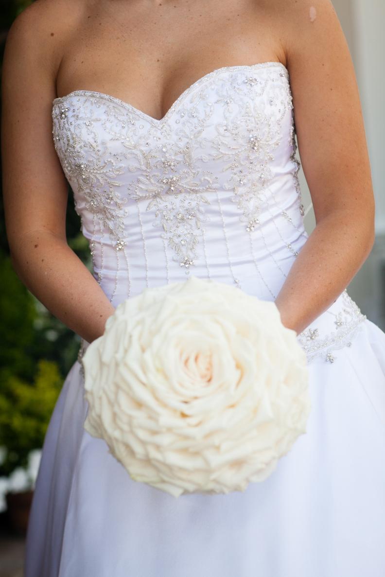 For her wedding on a private estate in Pasadena, California, this bride carried a glamelia, or bouquet made from the petals of white roses.