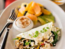 Sauteed spinach is a great way to work greens into this egg-white omelet.&nbsp;