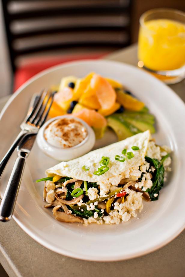 Sauteed spinach is a great way to work greens into this egg-white omelet.&nbsp;