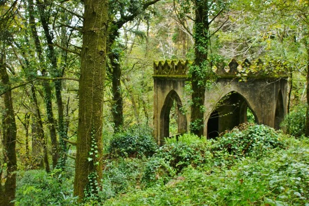 A cross between a gazebo and a canopy, this gothic inspired garden structure is almost hidden amid a lush forest in Parque da Pena in Sintra, Portugal.