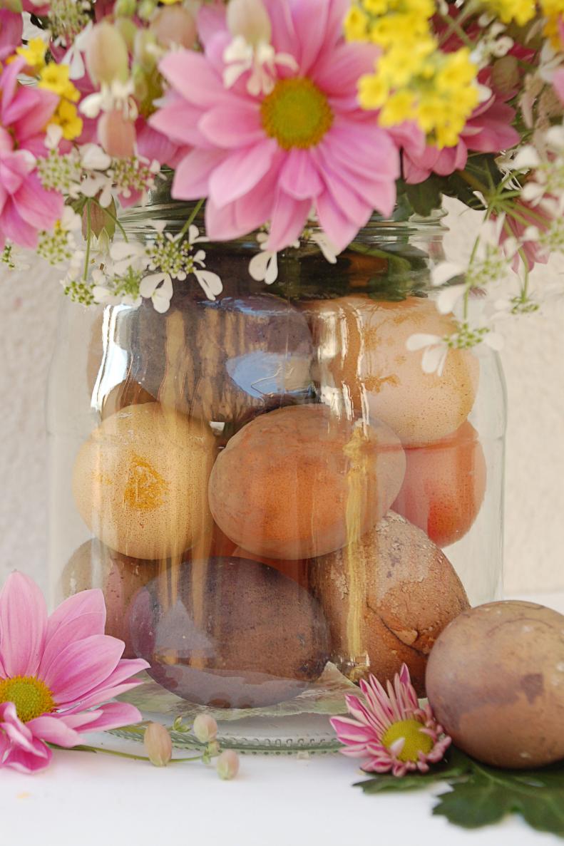 This beautiful Easter egg vase is made with recycled glass jars and naturally dyed Easter eggs. Each dye is quick and easy to make with fruits, fruit juice and spices you probably have around the house! And after Easter you can repurpose your beautiful vase to use all year round.