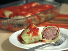Wrap savory meat filling in fresh cabbage leaves to make this classic comfort food.
