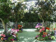 For this wedding ceremony site,&nbsp;Kimm Birkicht,&nbsp;co-founder and creative director of&nbsp;<a href="http://www.thevelvetgarden.com" target="_blank">The Velvet Garden</a> in Los Angeles, California, created islands of flowers around magnolia trees.