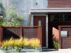 The stylish entrance to this San Francisco residence by Ohashi Design Studio includes an elegant Ipe wood fence with a stain of Missmers UV Plus.