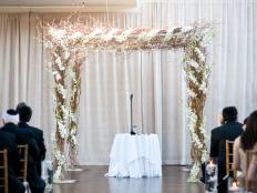 NYC's Ariston Flowers created used curly willow and orchids for this stunning chuppah, designed to match the modern feel of the downtown New York venue.