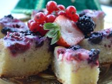 A traditional Arabic sweet cake gets a fresh twist with the addition of berries on top.