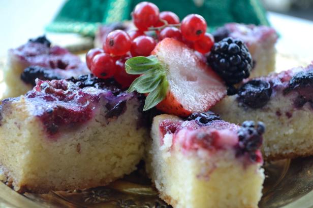 A traditional Arabic sweet cake gets a fresh twist with the addition of berries on top.