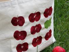 Create a fun apple-themed canvas tote bag perfect for apple picking.