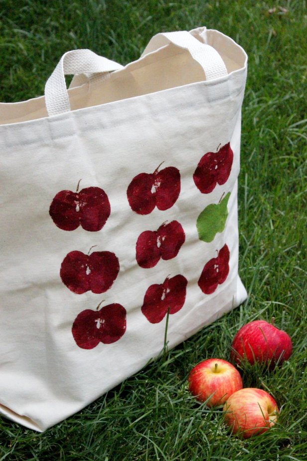 Create a fun apple-themed canvas tote bag perfect for apple picking.