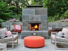 The home and outdoor area were remodeled to maximize its location on the fringe of a nature preserve in Massachusetts, says Mark Lawton, director of architecture and design for Ikaria Living. The backyard previously was only grass, but the homeowners now use it often, even for a recent backyard wedding. The bluestone seats are topped with ipe wood, and planters are built into the top of the seatback walls. The furniture is from Room &amp; Board; pillows are by local artisans. <a target="_blank" href="http://www.ikarialiving.com">ikarialiving.com</a>