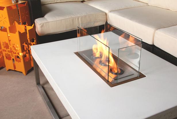 Contemporary options include this hand-casted concrete table with a stainless steel base. The Contempo fire table,<a href="http://www.authenteak.com/terraflame-rectangular-contempo-fire-table.html" target="_blank">&nbsp;by Terra Flame Home</a>, has&nbsp;South American Ipe wood accents. For the flame, the table uses a&nbsp;Isopropyl Alcohol-based gel canister that is reloaded like a candle, according to retailer AuthenTEAK.