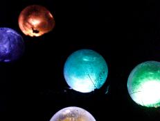 Greet garden guests and light up the night with these colorful icy orbs.