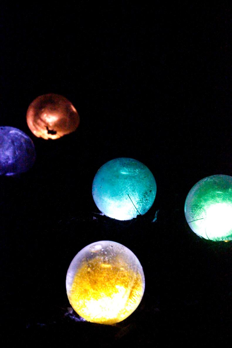Greet garden guests and light up the night with these colorful icy orbs.