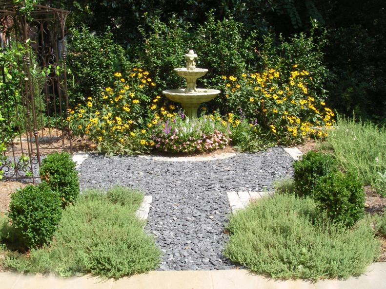 A fountain amid plants, an arbor and an herb garden are three key trends identified by garden designers for this spring. Using fountains in the garden design is an affordable way to add in a water element, says&nbsp;Danna Cain of Atlanta-based Home &amp; Garden Design.