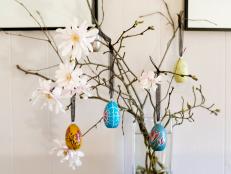 Decorated Wooden Eggs Hanging on Branches