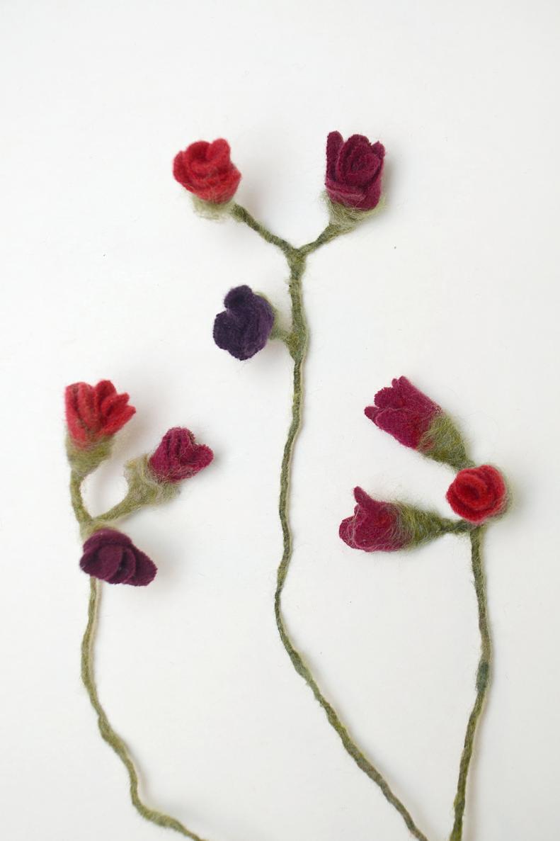 One of the easiest flowers to make is a rose. For our bouquet we made these miniature rose buds, but you can make your roses any size and any color you like.