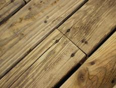 Planks that have cracked, split or rotted may need to be removed.  Individual planks may be pried up and replaced with new lumber of the  same type. Although a structurally sound choice, newer wood will not  match older when using a clear sealer or a semi-transparent stain.