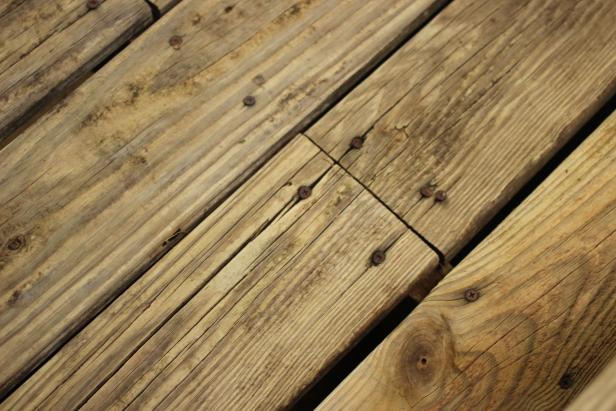 Planks that have cracked, split or rotted may need to be removed.  Individual planks may be pried up and replaced with new lumber of the  same type. Although a structurally sound choice, newer wood will not  match older when using a clear sealer or a semi-transparent stain.