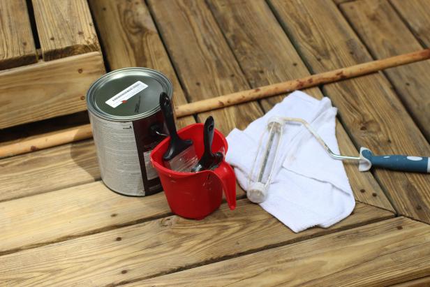 If the lumber used to build your deck looks just perfect in condition  and color, you may elect to apply a clear sealer. For most of us, the  deck will benefit from a little color, but the choice of stain used will  vary with preference and deck condition. A deck that is in good  condition with minimal splintering and uniform color throughout is a  good candidate for a semi-transparent stain, which soaks into the wood  and leaves the grain of the wood visible. Solid stains, as we use on  this project, coat the surface of the wood like paint and will hide  replaced lumber and minor weathering. If the condition of the wood is  especially weathered, a resurfacing stain containing grit is a forgiving  choice and can hide cracks as deep as &frac14;”.
