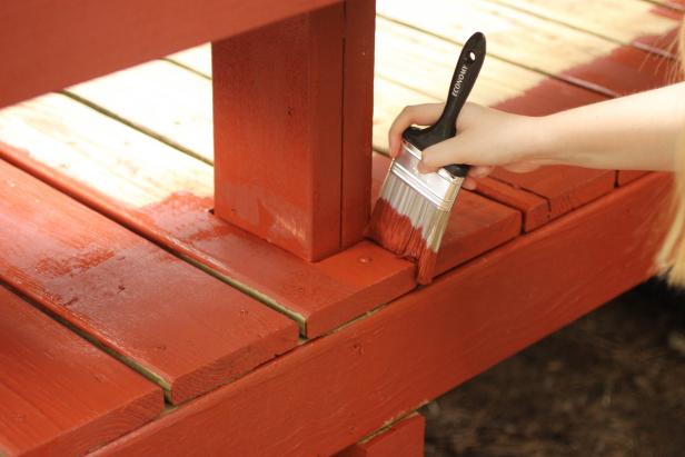 A paintbrush should be used in corners, railings and in gaps between  planks. Railings and gaps between deck boards require special attention  and can impact the amount of stain and time needed for the project.