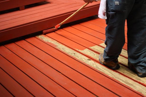 Apply stain from corner or wall to deck edge to allow an egress when finishing up.