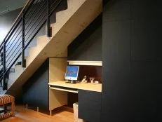 Storage and desk under staircase