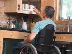 Man in wheelchair in kitchen