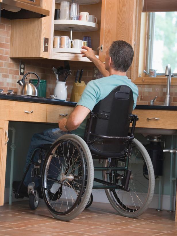 Man in wheelchair in kitchen