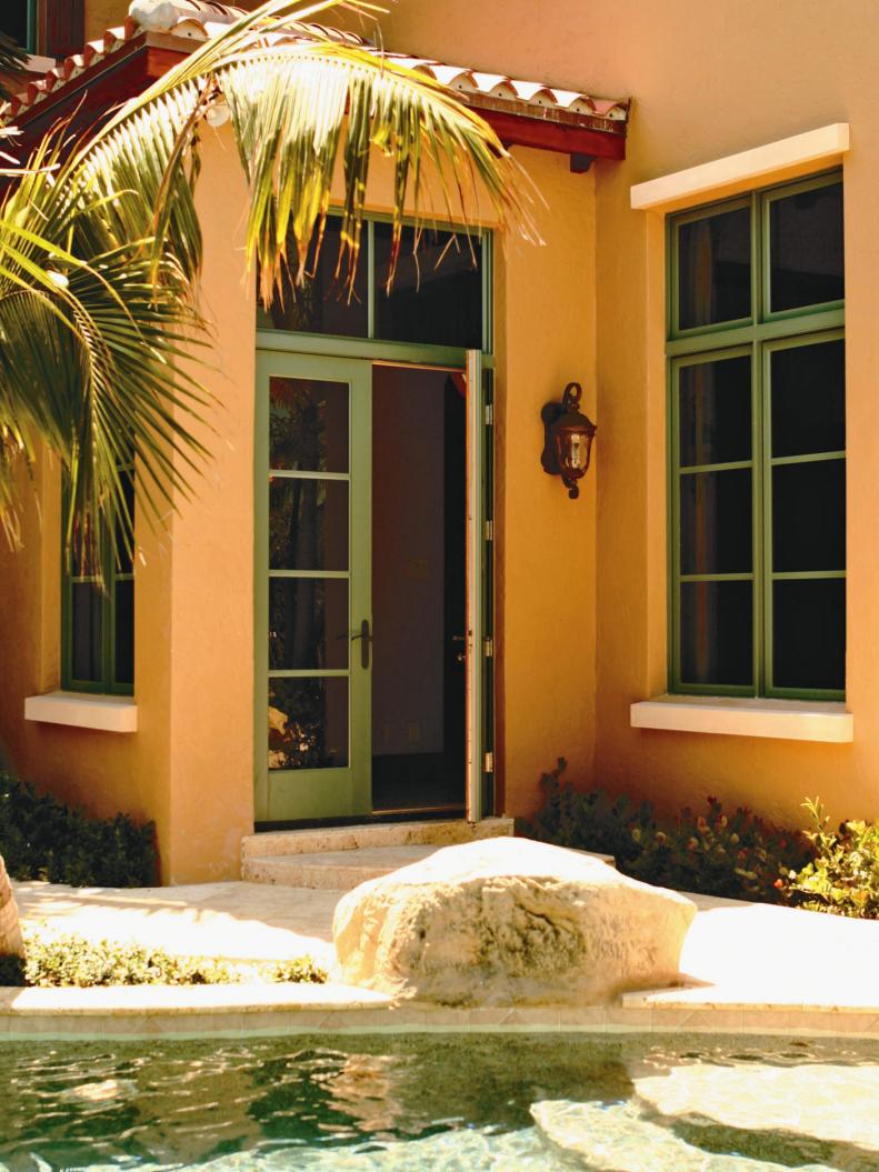 Southwestern style patio with large French doors