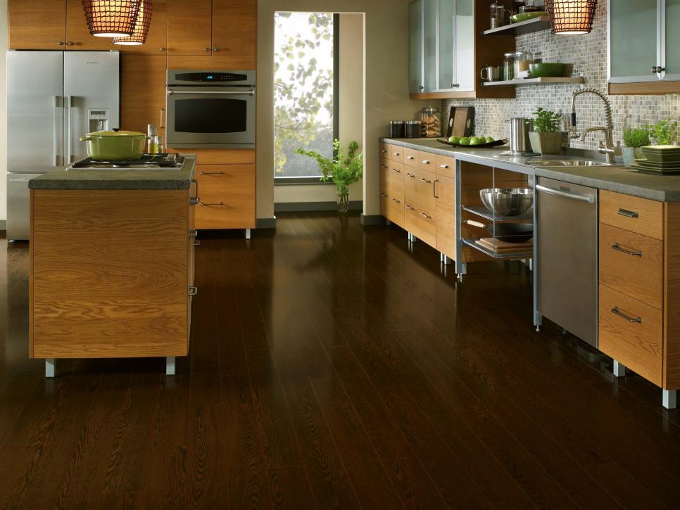 Laminate Flooring For Basements, How To Lay Laminate Floor In Kitchen Cabinets