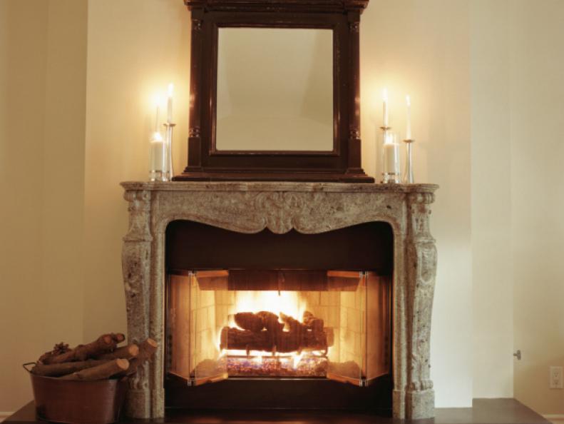 Fireplace with candles on mantle