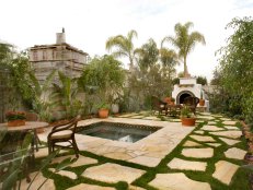 Hot Tub Surrounded by Stone & Grass, Terra Cotta Planters