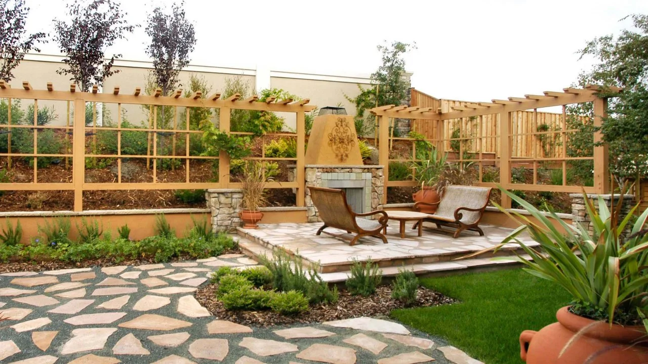 Garden seating area with comfortable furniture and shade