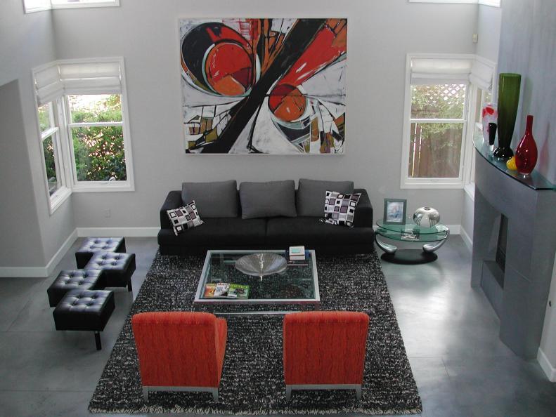 Gray Contemporary Living Room With Red Artwork, Chairs and Vases