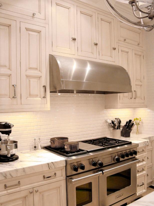 Kitchen with outlet vent hood