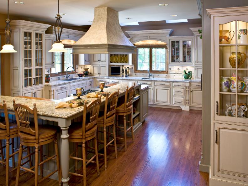 Neutral Kitchen With Distressed Cabinetry, L-Shaped Breakfast Bar 