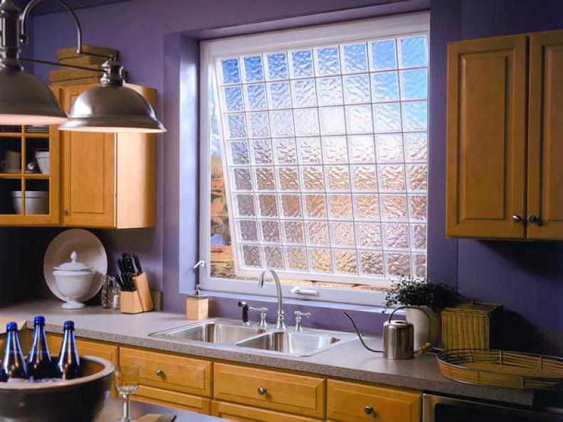 Large Swinging Window Above Sink in Purple Kitchen