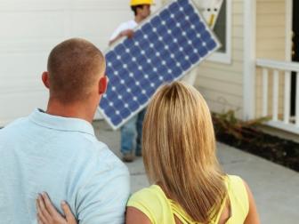 iStock-8999100_homeowners-installing-solar-panels-crop_s4x3