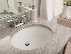 After 15. New granite countertops and undermounted, easy to clean sinks were installed in this bathroom for a much more modern feel.