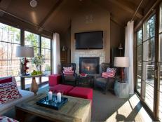 A weatherproof gathering space offers space to socialize, enjoy views and gather by a cozy fire.