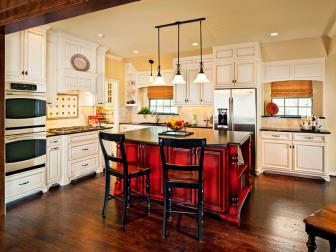 White traditional kitchen with red island