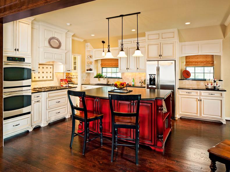 White traditional kitchen with red island