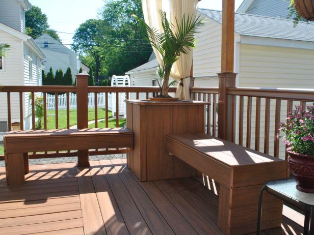 As seen on HGTV's Don't Sweat It, this composite deck design has great shade and a nice railing with plant decor. 